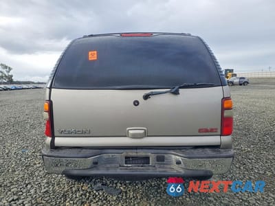 Zdjęcie 6 z 13 samochodu: 2002 GMC YUKON VIN:1GKEC13T12R223353 - miniatura