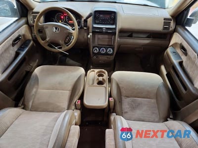 Zdjęcie 8 z 13 samochodu: 2003 HONDA CR-V LX VIN:JHLRD68463C011368 - miniatura
