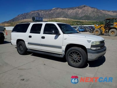 Czwarte zdjęcie samochodu z boku: 2002 CHEVROLET SUBURBAN C1500 VIN:3GNEC16T92G343741 - miniatura