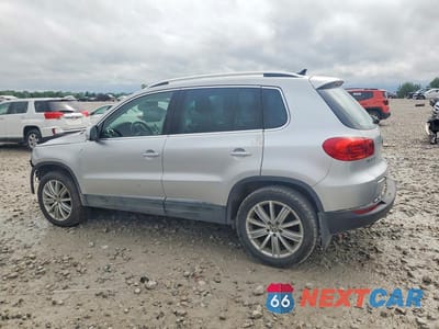 Drugie zdjęcie samochodu z przodu: 2014 VOLKSWAGEN TIGUAN S VIN:WVGBV3AX0EW580132 - miniatura