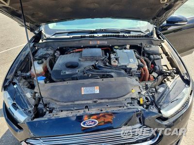 Zdjęcie 11 z 13 samochodu: 2016 FORD FUSION TITANIUM PHEV VIN:3FA6P0SU1GR229566 - miniatura