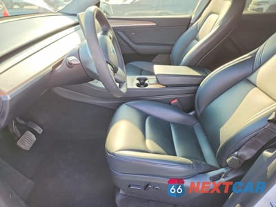 Zdjęcie 7 z 12 samochodu: 2023 TESLA MODEL Y VIN:7SAYGDEE7PA079088 - miniatura