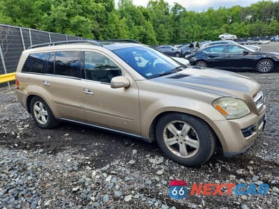 Czwarte zdjęcie samochodu z boku: 2007 MERCEDES-BENZ GL 450 4MATIC VIN:4JGBF71E37A122216 - miniatura