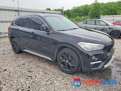 Czwarte zdjęcie samochodu z boku: 2018 BMW X1 SDRIVE28I VIN:WBXHU7C38J5H43098 - miniatura