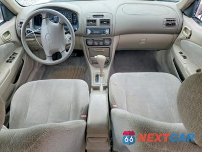 Zdjęcie 8 z 12 samochodu: 2002 TOYOTA COROLLA LE VIN:2T1BR12E72C562323 - miniatura