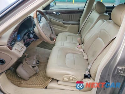 Zdjęcie 7 z 12 samochodu: 2004 CADILLAC DEVILLE DHS VIN:1G6KE54Y34U119783 - miniatura