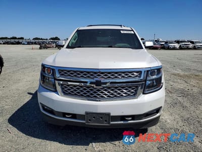 Piąte zdjęcie samochodu w środku: 2017 CHEVROLET SUBURBAN K1500 LT VIN:1GNSKHKC2HR289163 - miniatura