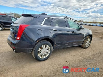 Trzecie zdjęcie samochodu z tyłu: 2013 CADILLAC SRX PREMIUM COLLECTION VIN:3GYFNJE32DS523176 - miniatura