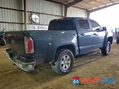 Trzecie zdjęcie samochodu z tyłu: 2019 GMC CANYON VIN:1GTG5BEN7K1355888 - miniatura
