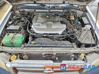 Zdjęcie 12 z 13 samochodu: 2002 NISSAN PATHFINDER SE VIN:JN8DR09YX2W713900 - miniatura
