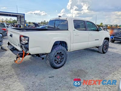 Trzecie zdjęcie samochodu z tyłu: 2022 TOYOTA TACOMA SR5 V6 VIN:3TMAZ5CN5NM169255 - miniatura