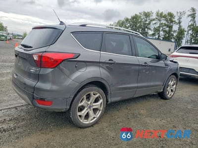 Trzecie zdjęcie samochodu z tyłu: 2019 FORD ESCAPE TITANIUM VIN:1FMCU9J95KUC05484 - miniatura