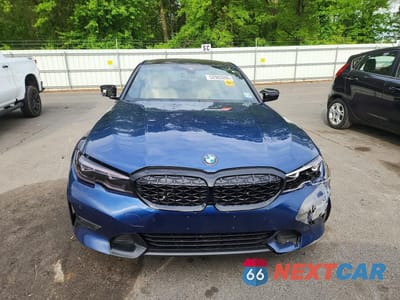 Piąte zdjęcie samochodu w środku: 2021 BMW 330XI VIN:3MW5R7J06M8B84887 - miniatura