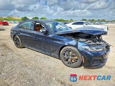 Czwarte zdjęcie samochodu z boku: 2023 BMW 540 XI VIN:WBA73BJ09PWX93352 - miniatura