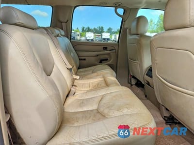 Zdjęcie 10 z 12 samochodu: 2004 GMC YUKON XL K1500 VIN:1GKFK16Z24J103764 - miniatura