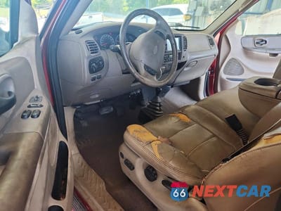 Zdjęcie 8 z 12 samochodu: 2002 FORD F150 VIN:1FTRX18L22NB73368 - miniatura