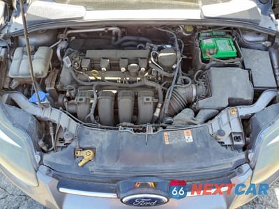 Zdjęcie 11 z 13 samochodu: 2014 FORD FOCUS TITANIUM VIN:1FADP3N21EL311957 - miniatura