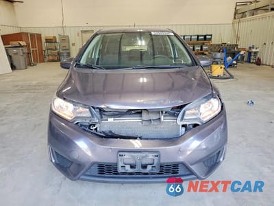Piąte zdjęcie samochodu w środku: 2016 HONDA FIT LX VIN:JHMGK5H56GX032277 - miniatura