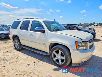 Czwarte zdjęcie samochodu z boku: 2011 CHEVROLET TAHOE VIN:1GNSKCE03BR134617 - miniatura