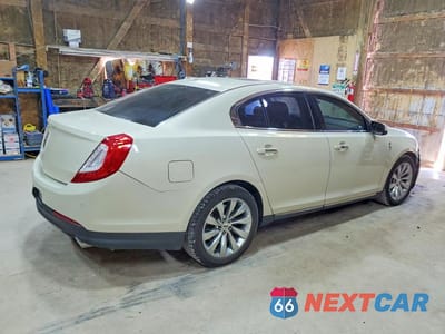 Trzecie zdjęcie samochodu z tyłu: 2014 LINCOLN MKS VIN:1LNHL9EK9EG607162 - miniatura