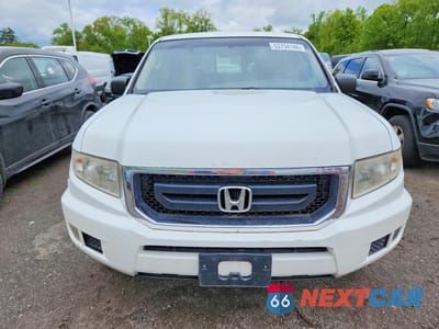 Piąte zdjęcie samochodu w środku: 2009 HONDA RIDGELINE RT VIN:5FPYK16219B102621 - miniatura