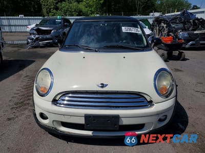 Piąte zdjęcie samochodu w środku: 2009 MINI COOPER VIN:WMWMF33519TW72988 - miniatura
