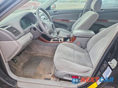 Zdjęcie 7 z 12 samochodu: 2003 TOYOTA CAMRY XLE VIN:4T1BE30KX3U152292 - miniatura