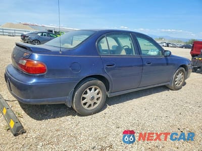Trzecie zdjęcie samochodu z tyłu: 1999 CHEVROLET MALIBU VIN:1G1NE52M5X6249091 - miniatura