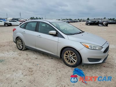 Czwarte zdjęcie samochodu z boku: 2016 FORD FOCUS SE VIN:1FADP3F27GL387071 - miniatura