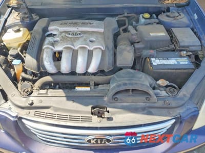 Zdjęcie 11 z 12 samochodu: 2006 KIA OPTIMA LX VIN:KNAGE123865074210 - miniatura
