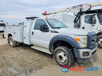 Czwarte zdjęcie samochodu z boku: 2015 FORD F550 SUPER DUTY VIN:1FDUF5GY5FEC42539 - miniatura