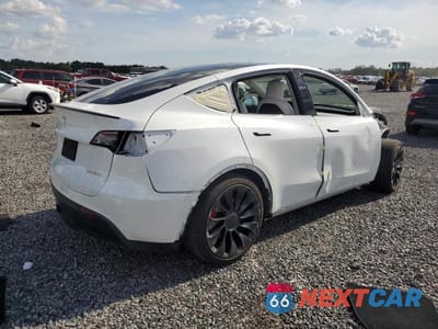 Trzecie zdjęcie samochodu z tyłu: 2022 TESLA MODEL Y VIN:7SAYGDEF0NF517779 - miniatura