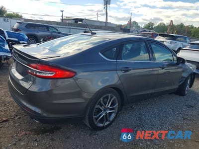 Trzecie zdjęcie samochodu z tyłu: 2017 FORD FUSION SE VIN:3FA6P0H78HR148227 - miniatura