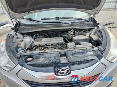 Zdjęcie 12 z 13 samochodu: 2013 HYUNDAI TUCSON LIMITED VIN:KM8JUCAC4DU563730 - miniatura