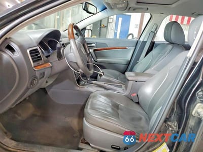 Zdjęcie 7 z 13 samochodu: 2010 LINCOLN MKZ VIN:3LNHL2JC2AR654719 - miniatura