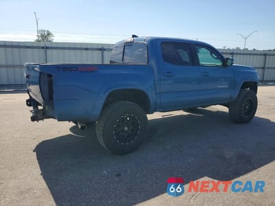 Trzecie zdjęcie samochodu z tyłu: 2019 TOYOTA TACOMA TRD SPORT VIN:3TMCZ5AN2KM215289 - miniatura