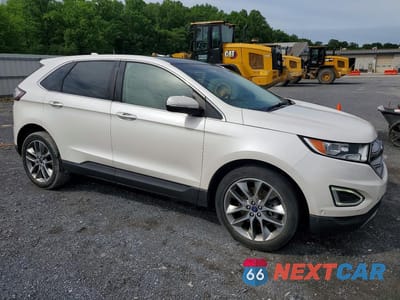 Czwarte zdjęcie samochodu z boku: 2015 FORD EDGE TITANIUM VIN:2FMPK4K84FBB63711 - miniatura