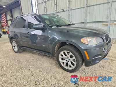 Czwarte zdjęcie samochodu z boku: 2011 BMW X5 XDRIVE35I VIN:5UXZV4C55BL740067 - miniatura