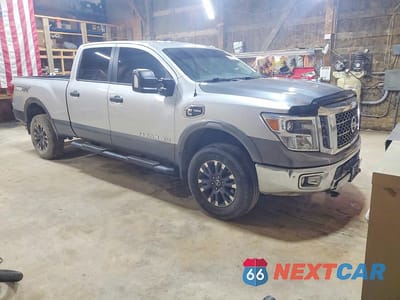 Czwarte zdjęcie samochodu z boku: 2019 NISSAN TITAN XD PRO-4X VIN:1N6BA1F46KN521247 - miniatura