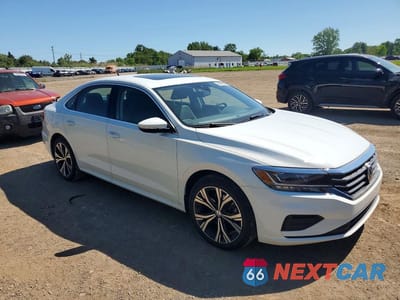 Czwarte zdjęcie samochodu z boku: 2022 VOLKSWAGEN PASSAT SE VIN:1VWSA7A3XNC001554 - miniatura