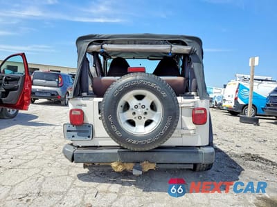 Zdjęcie 6 z 13 samochodu: 2002 JEEP WRANGLER / TJ SPORT VIN:1J4FA49S92P755378 - miniatura