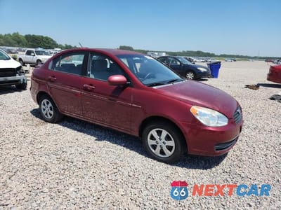 Czwarte zdjęcie samochodu z boku: 2011 HYUNDAI ACCENT GLS VIN:KMHCN4AC7BU601671 - miniatura