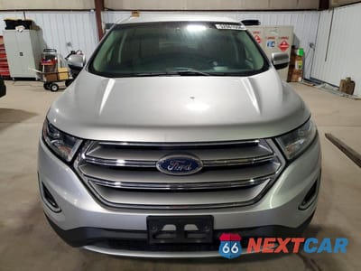 Piąte zdjęcie samochodu w środku: 2017 FORD EDGE TITANIUM VIN:2FMPK4K98HBC30127 - miniatura
