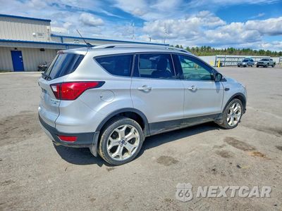 Trzecie zdjęcie samochodu z tyłu: 2019 FORD ESCAPE TITANIUM VIN:1FMCU9J98KUC17676 - miniatura