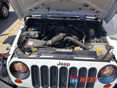 Zdjęcie 12 z 13 samochodu: 2011 JEEP WRANGLER UNLIMITED SAHARA VIN:1J4BA5H15BL592815 - miniatura