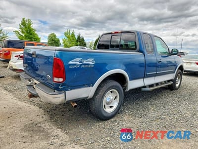 Trzecie zdjęcie samochodu z tyłu: 2000 FORD F150 VIN:1FTRX18L4YNA41396 - miniatura