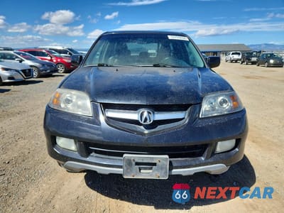 Piąte zdjęcie samochodu w środku: 2004 ACURA MDX VIN:2HNYD18224H560021 - miniatura