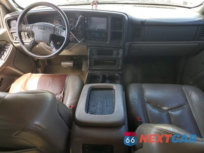 Zdjęcie 8 z 13 samochodu: 2004 GMC YUKON VIN:1GKEK13Z34J167618 - miniatura