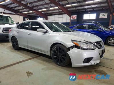 Czwarte zdjęcie samochodu z boku: 2018 NISSAN ALTIMA 2.5 SV VIN:1N4AL3AP3JC201387 - miniatura
