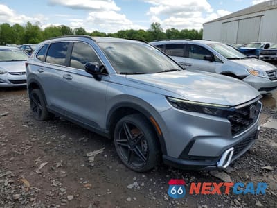 Czwarte zdjęcie samochodu z boku: 2023 HONDA CR-V SPORT TOURING VIN:2HKRS6H98PH807371 - miniatura